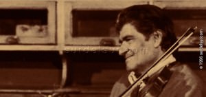 Performer Sixto Palavecino playing violin
