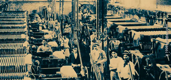Workers in the interior of an industrial plant. (1920)